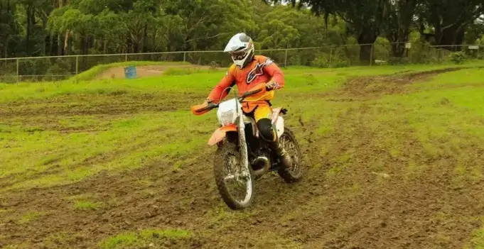 Sitting and Accelerating Dirt Bike